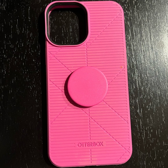 iPhone 12 Pro Max otter box pop sockets case.